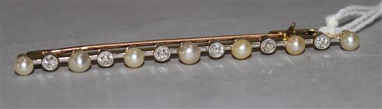 A diamond and pearl bar brooch 6.5cm.